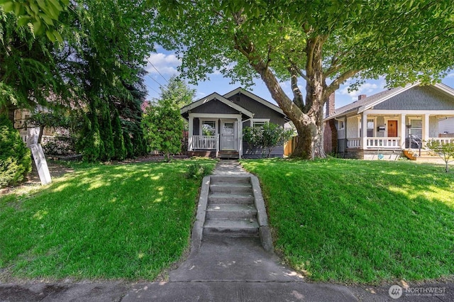 4035 A St, Tacoma, WA 98418 - view of front of house with covered porch and a front yard