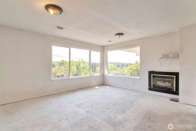 21027 7th Pl S, Des Moines, WA 98198 - unfurnished living room featuring a glass covered fireplace