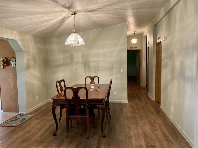 8322 Shoemaker Rd, Tulalip, WA 98271 - dining space with wood finished floors, baseboards, and a chandelier