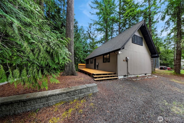 33 N Summit Dr, Bellingham, WA 98229 - view of property exterior featuring a deck and roof with shingles