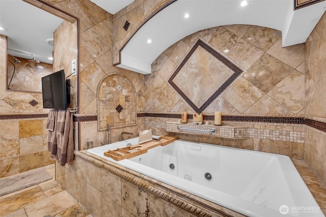 6490 NE Monte Vista Dr, Bainbridge Island, WA 98110 - bathroom with tile walls, a jetted tub, and recessed lighting