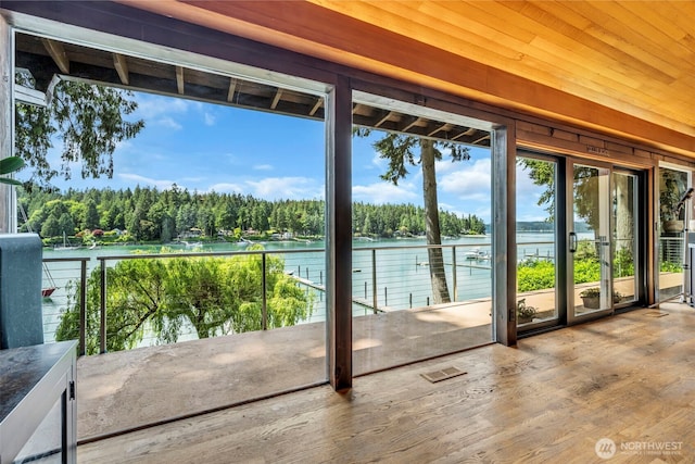 6490 NE Monte Vista Dr, Bainbridge Island, WA 98110 - entryway with a water view and wood finished floors