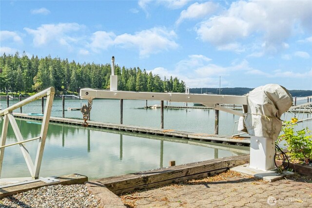 6490 NE Monte Vista Dr, Bainbridge Island, WA 98110 - view of pool featuring a water view and a boat dock