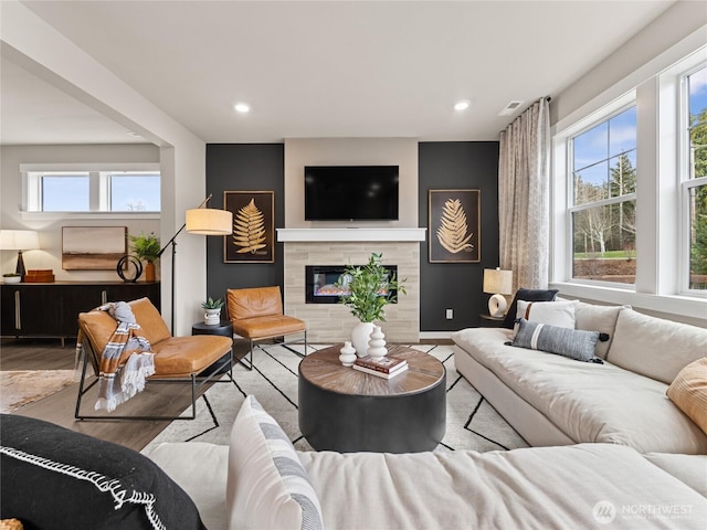 8310 115th Pl SE Unit 3, Newcastle, WA 98056 - living area featuring wood finished floors, recessed lighting, and a fireplace