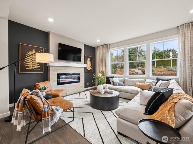 8310 115th Pl SE Unit 3, Newcastle, WA 98056 - living room with baseboards, wood finished floors, recessed lighting, and a fireplace