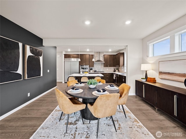 8310 115th Pl SE Unit 3, Newcastle, WA 98056 - dining space with wood finished floors, baseboards, and recessed lighting