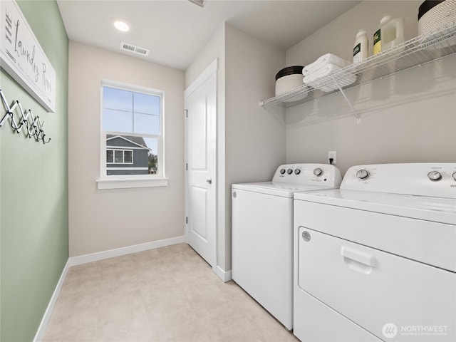 8310 115th Pl SE Unit 3, Newcastle, WA 98056 - washroom with washer and clothes dryer and baseboards