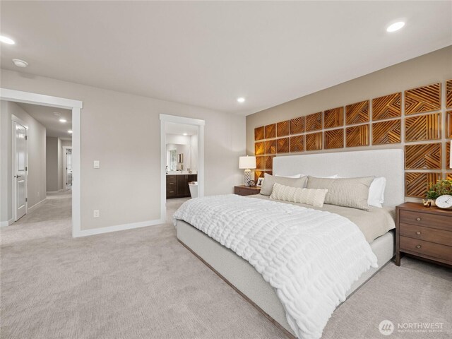 8310 115th Pl SE Unit 3, Newcastle, WA 98056 - bedroom with recessed lighting, light colored carpet, baseboards, and ensuite bathroom