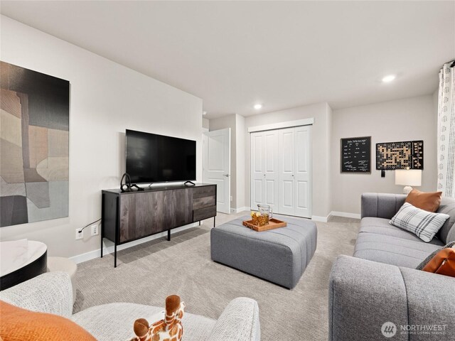 8310 115th Pl SE Unit 3, Newcastle, WA 98056 - living area featuring carpet floors, baseboards, and recessed lighting