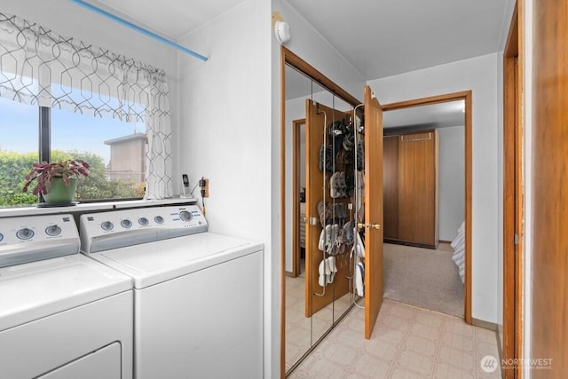 11939 SE 169th Pl, Renton, WA 98058 - laundry area with washer and clothes dryer and light flooring