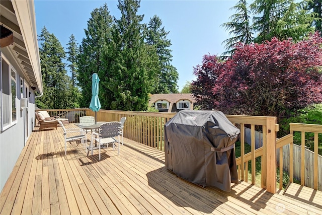 608 Harvest Rd, Bothell, WA 98012 - wooden terrace with outdoor dining area and grilling area