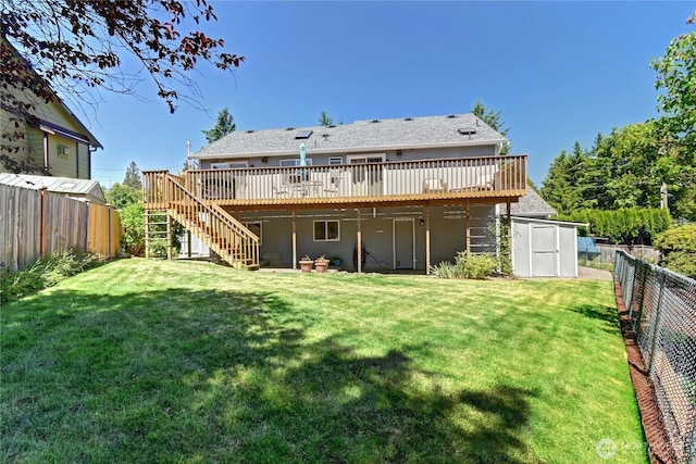 608 Harvest Rd, Bothell, WA 98012 - back of property featuring stairway, a deck, a fenced backyard, and a storage shed