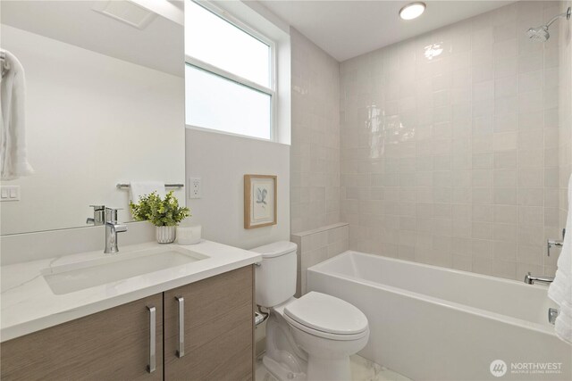 724 N 36th St, Seattle, WA 98103 - bathroom featuring toilet, vanity, shower / washtub combination, marble finish flooring, and recessed lighting
