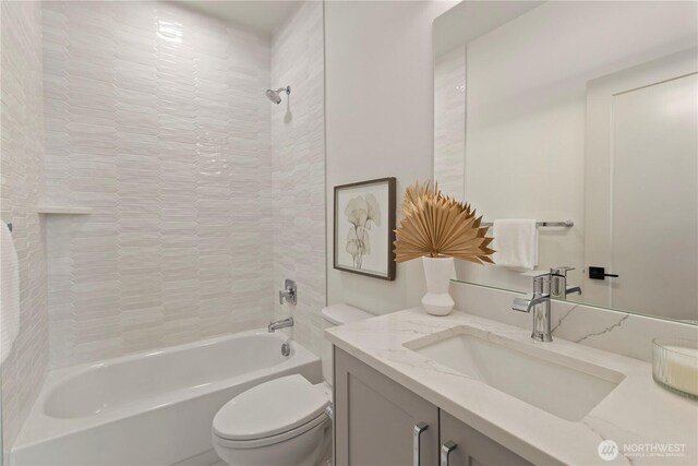 724 N 36th St, Seattle, WA 98103 - bathroom featuring shower / bath combination, toilet, and vanity