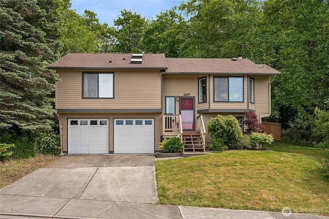 1417 S 263rd Pl, Des Moines, WA 98198 - split foyer home with an attached garage, a front yard, and concrete driveway