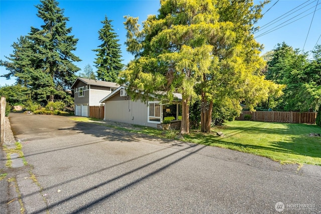 18008 Ashworth Ave N, Shoreline, WA 98133 - view of front of house with driveway and a garage
