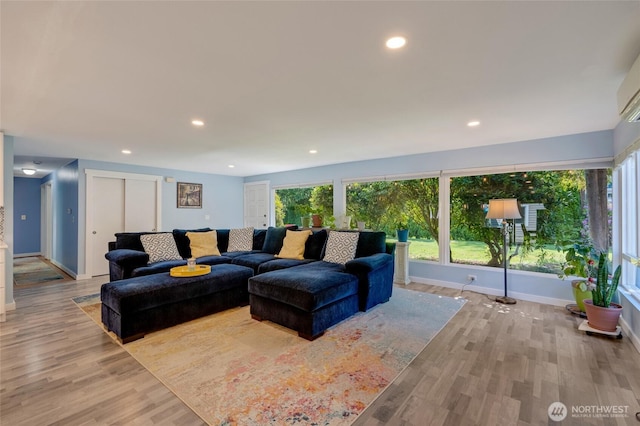 18008 Ashworth Ave N, Shoreline, WA 98133 - living area featuring light wood-style flooring, baseboards, and recessed lighting