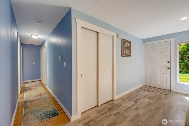 18008 Ashworth Ave N, Shoreline, WA 98133 - entrance foyer with light wood-style floors and baseboards