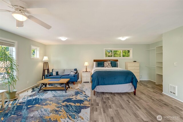 18008 Ashworth Ave N, Shoreline, WA 98133 - bedroom featuring wood finished floors, baseboards, and a ceiling fan