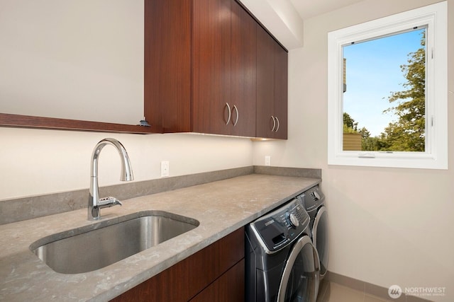 1311 Palm Ave SW, Seattle, WA 98116 - laundry room with cabinet space, separate washer and dryer, and baseboards