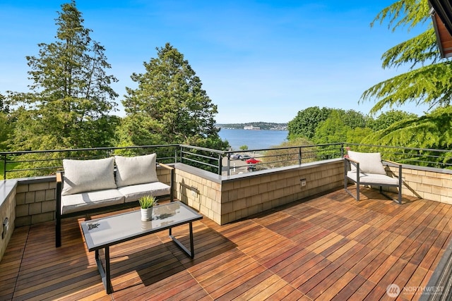 1311 Palm Ave SW, Seattle, WA 98116 - wooden deck with a water view and an outdoor hangout area