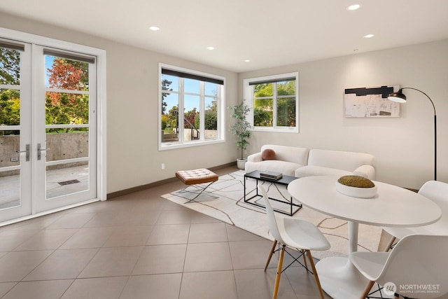 1311 Palm Ave SW, Seattle, WA 98116 - tiled living room with recessed lighting and baseboards
