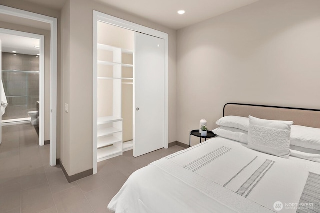 1311 Palm Ave SW, Seattle, WA 98116 - bedroom with baseboards, recessed lighting, a closet, and light tile patterned floors