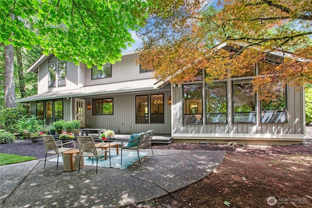 19306 SE 21st St, Sammamish, WA 98075 - back of property with a patio and an outdoor living space