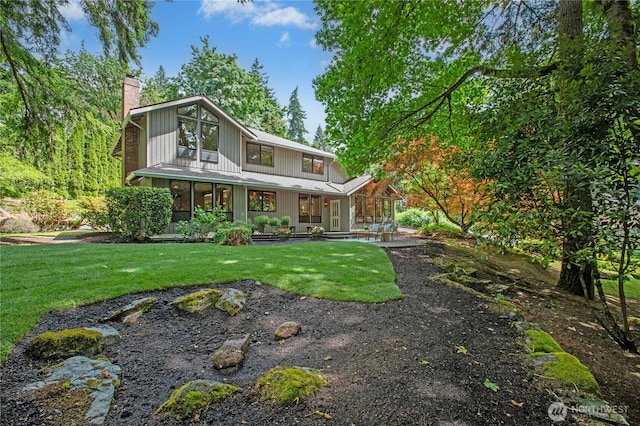 19306 SE 21st St, Sammamish, WA 98075 - rear view of house featuring a chimney and a yard