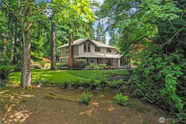 19306 SE 21st St, Sammamish, WA 98075 - view of front of home with a chimney and a front yard