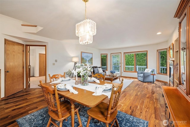 4315 Village Dr Unit B, Bellingham, WA 98226 - dining space with wood-type flooring, a chandelier, and recessed lighting