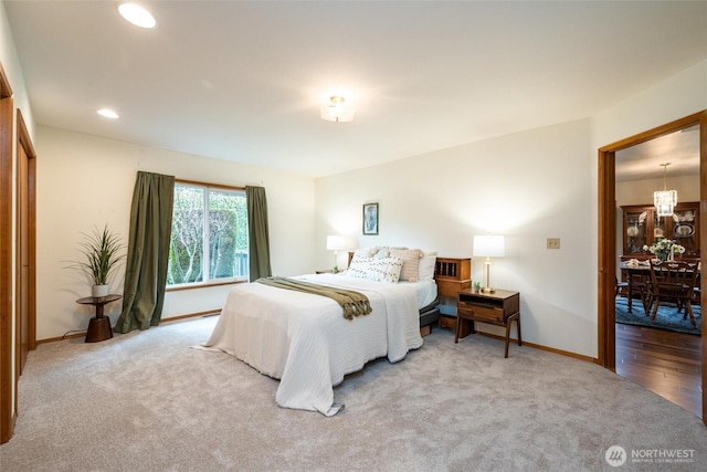 4315 Village Dr Unit B, Bellingham, WA 98226 - carpeted bedroom featuring baseboards, a chandelier, and recessed lighting