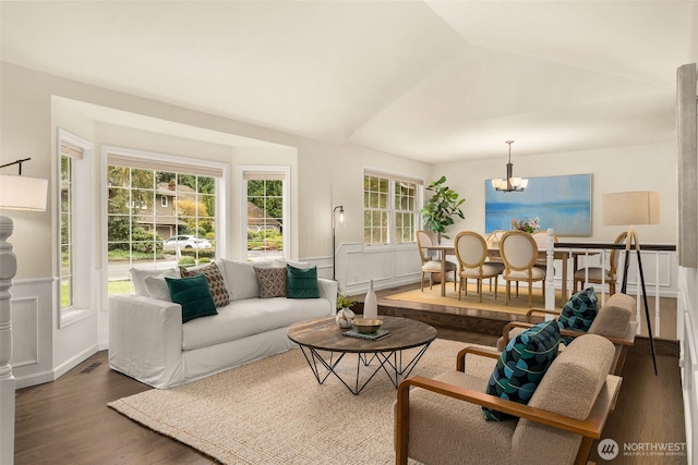 21024 NE 36th St, Sammamish, WA 98074 - living area featuring dark wood-style floors, a chandelier, and vaulted ceiling
