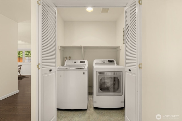 21024 NE 36th St, Sammamish, WA 98074 - laundry area featuring washing machine and dryer and baseboards