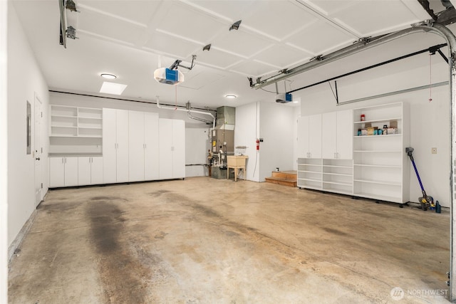21024 NE 36th St, Sammamish, WA 98074 - garage with a garage door opener, a sink, and electric panel