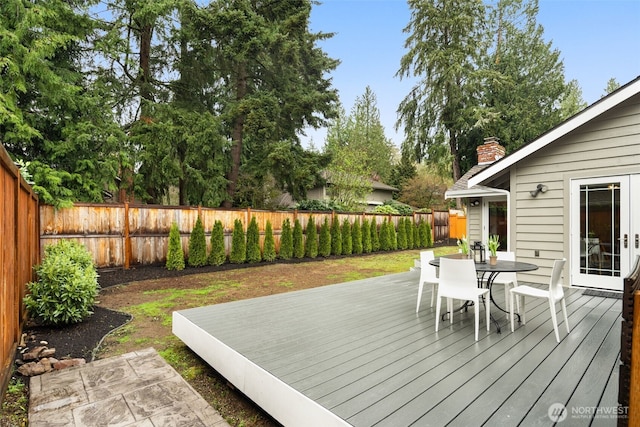 21024 NE 36th St, Sammamish, WA 98074 - wooden deck featuring outdoor dining space and a fenced backyard