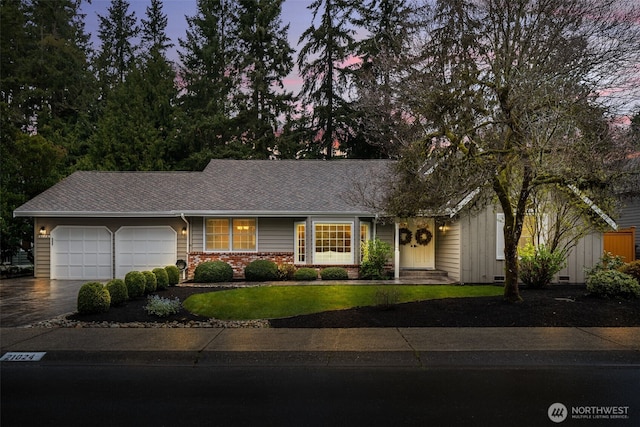 21024 NE 36th St, Sammamish, WA 98074 - ranch-style house with driveway, a garage, roof with shingles, a front yard, and brick siding