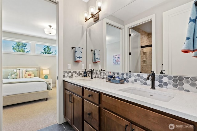 15535 NE 60th St, Redmond, WA 98052 - ensuite bathroom with double vanity, tasteful backsplash, and a tile shower