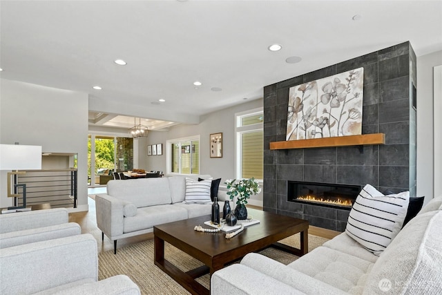 15535 NE 60th St, Redmond, WA 98052 - living area featuring recessed lighting, a fireplace, wood finished floors, beamed ceiling, and a chandelier