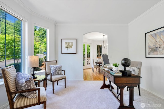 7817 NE 112th St, Kirkland, WA 98034 - office area featuring healthy amount of natural light, arched walkways, light colored carpet, ornamental molding, and a chandelier