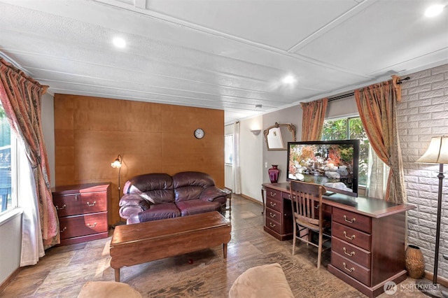 8445 Golden Valley Dr, Maple Falls, WA 98266 - office space featuring recessed lighting, baseboards, an accent wall, and wood walls