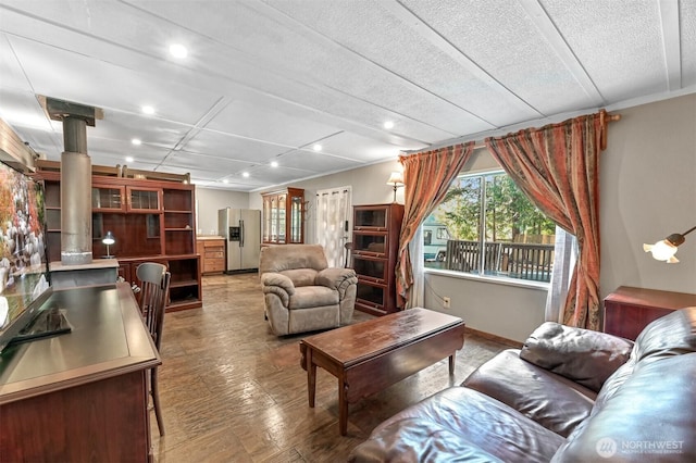 8445 Golden Valley Dr, Maple Falls, WA 98266 - living room with recessed lighting, light wood-style floors, baseboards, and a textured ceiling