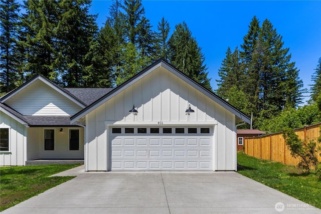 401 Flair Valley Ct, Maple Falls, WA 98266 - modern inspired farmhouse featuring a shingled roof, board and batten siding, an attached garage, and concrete driveway