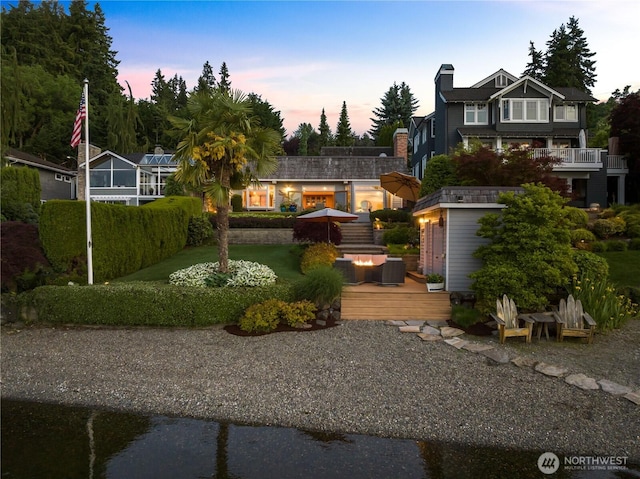 17834 SE 40th Pl, Bellevue, WA 98008 - yard at dusk with a deck