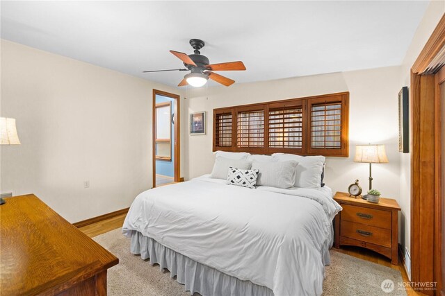 17834 SE 40th Pl, Bellevue, WA 98008 - bedroom with ceiling fan and baseboards