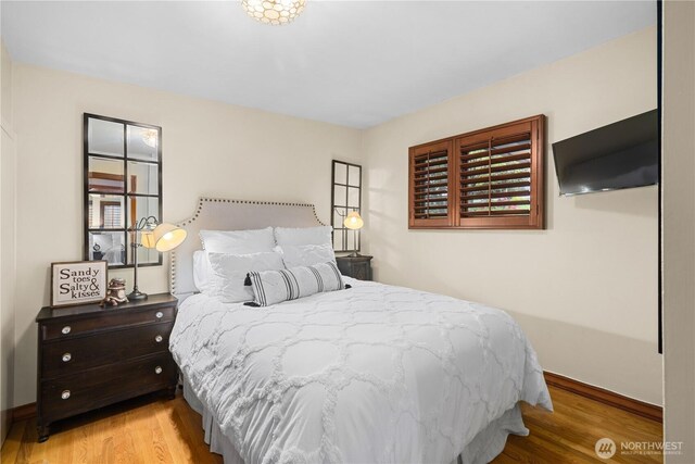 17834 SE 40th Pl, Bellevue, WA 98008 - bedroom featuring wood finished floors and baseboards