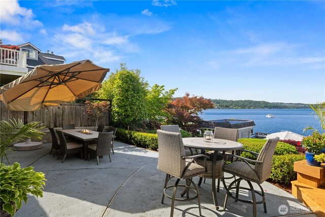 17834 SE 40th Pl, Bellevue, WA 98008 - view of patio / terrace featuring a fire pit, outdoor dining area, and a water view