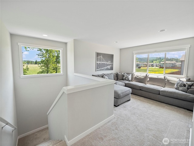 208 Hovey St, Buckley, WA 98321 - living area with light carpet, baseboards, and recessed lighting