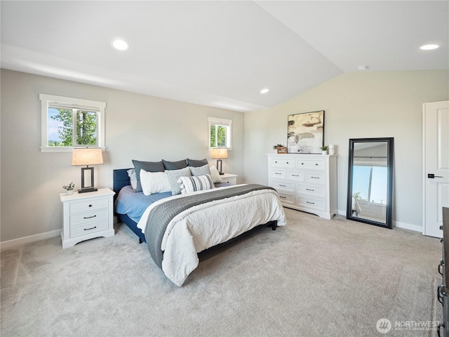 208 Hovey St, Buckley, WA 98321 - bedroom featuring light colored carpet, vaulted ceiling, multiple windows, baseboards, and recessed lighting