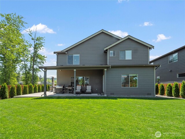 208 Hovey St, Buckley, WA 98321 - rear view of house featuring a patio, a yard, and an outdoor living space